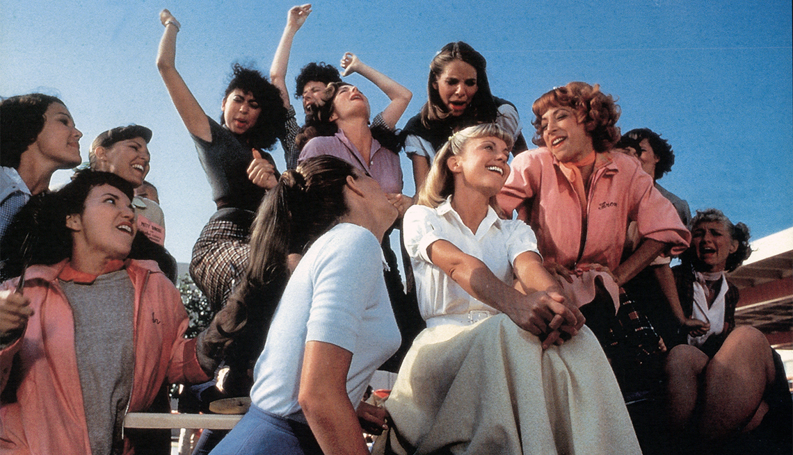 Olivia Newton-John, Didi Conn and the rest of the girls sing in a scene from the 1978 film "Grease" Olivia Newton-John, Didi Conn and the rest of the girls sing in a scene from the 1978 film "Grease"